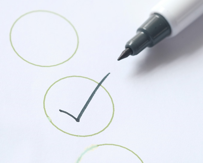 checkmark of an approvals workflow with pen